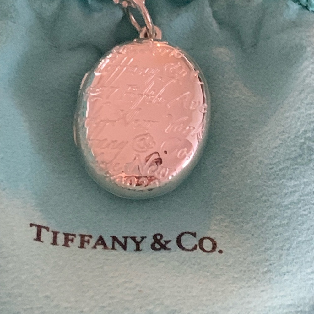 TIFFANY & CO. LOCKET AND BEADED NECKLACE